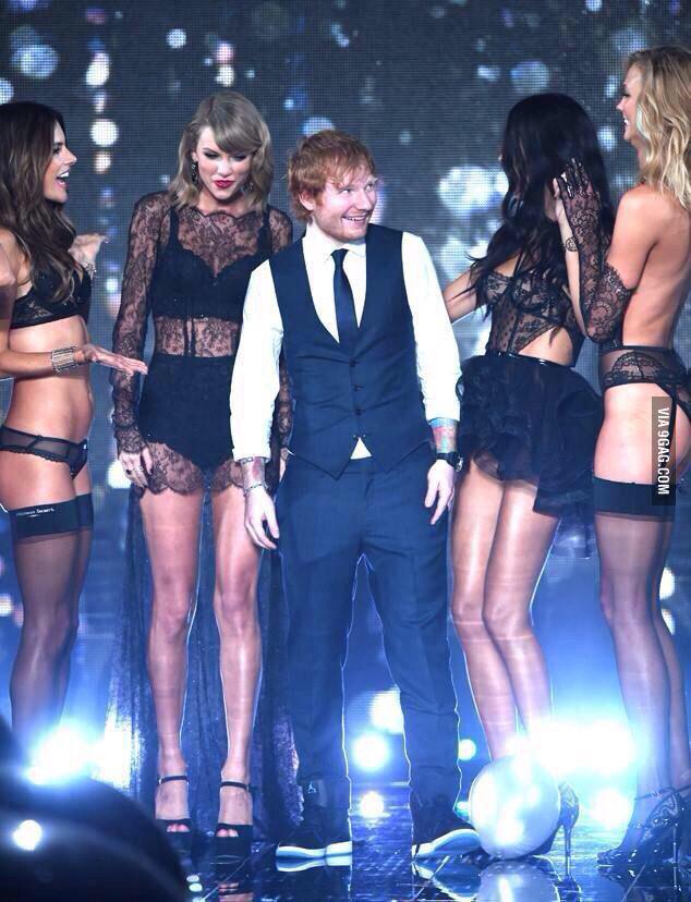 You-might-think-youre-happy-but-youre-not-Ed-Sheeran-standing-in-the-middle-of-Victorias-Secret-models-happy.jpg