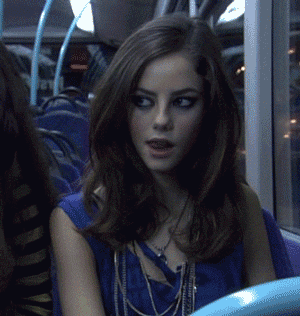 Kaya_Scodelario_giving_you_the_looks_on_the_bus.gif